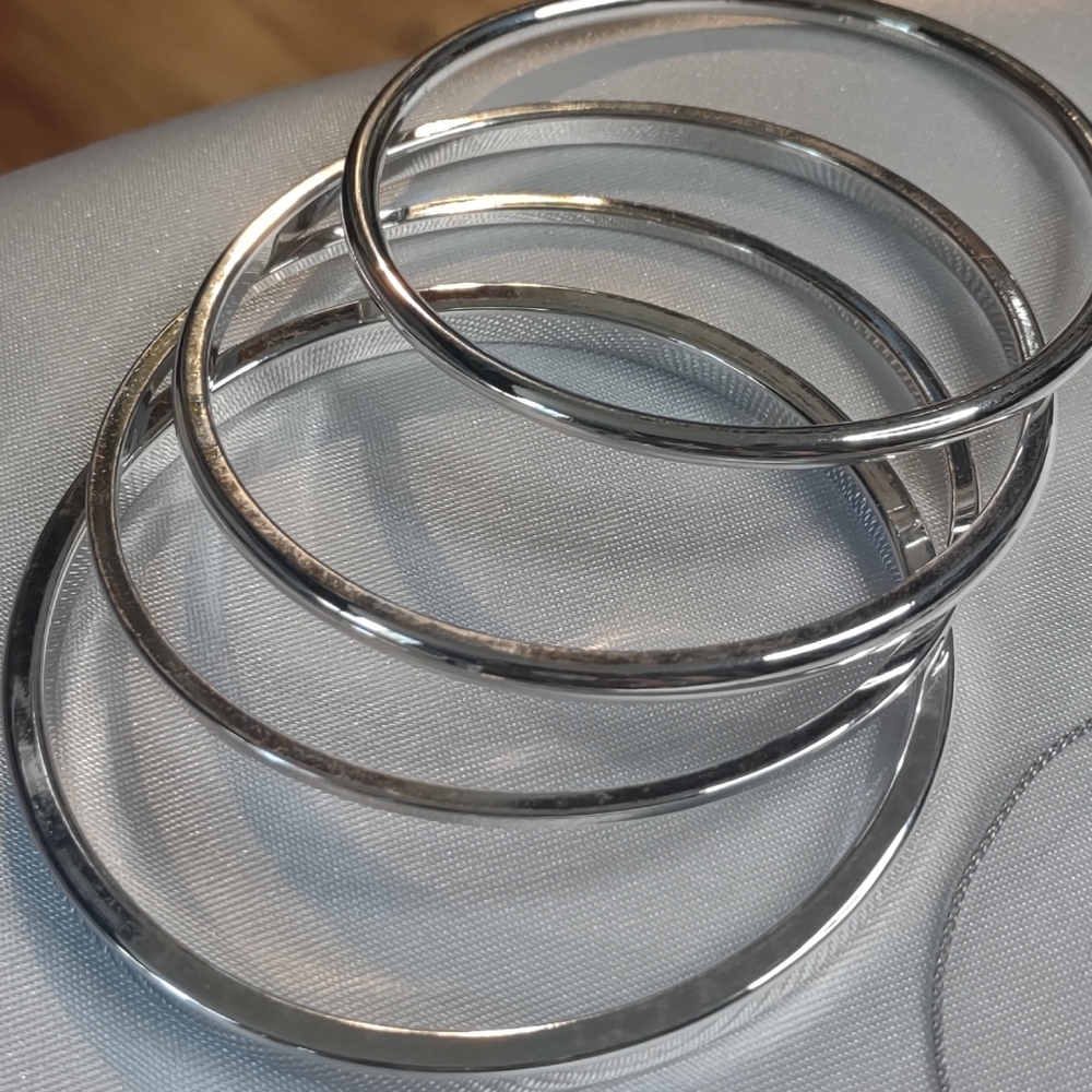 Lot of custom silver tone jewelry